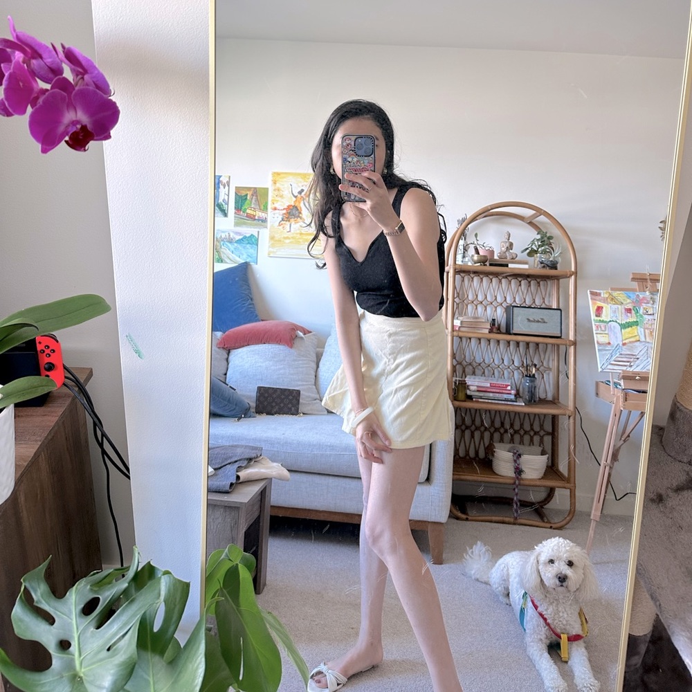 Top: Other stories- knit black top , bottom- white skirt